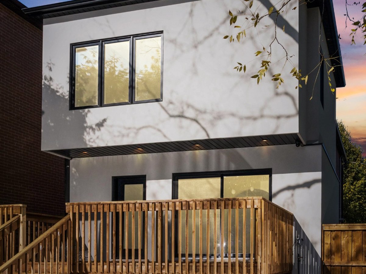 home-after-addition-back-yard-view